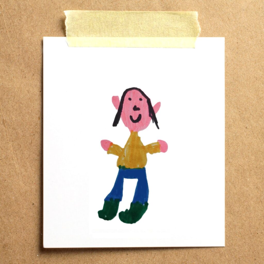 Tekening van een meisje of mevrouw op een prikbord